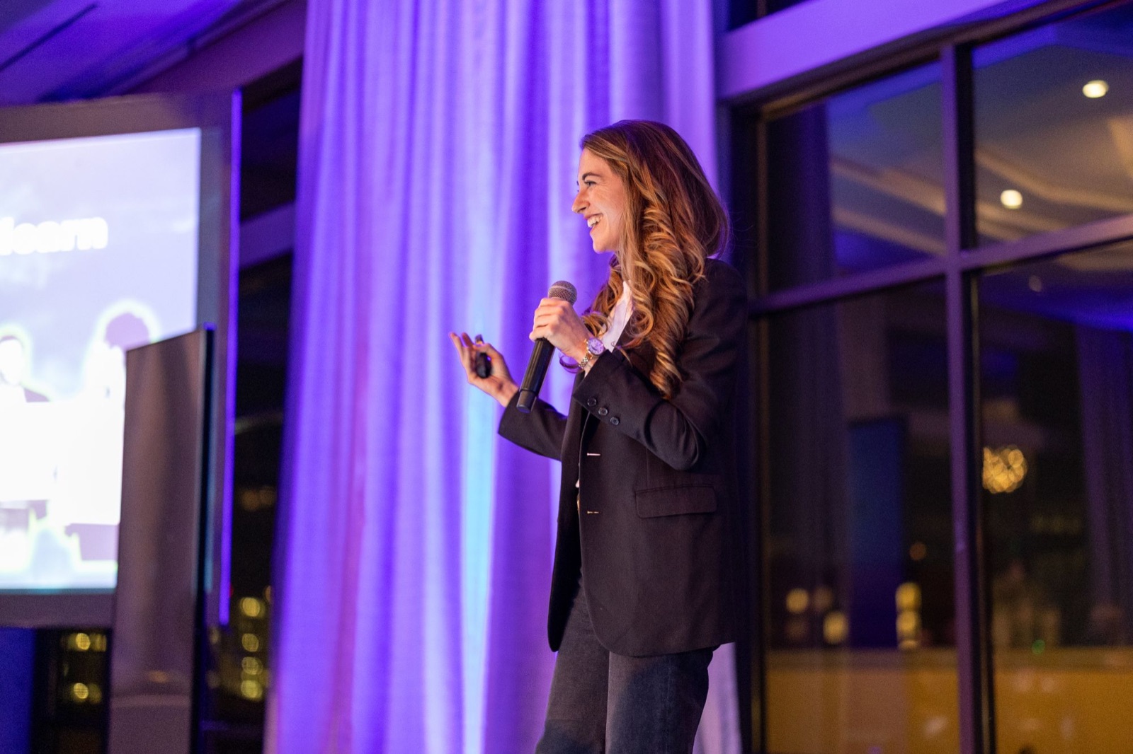 Kristin Messerli, on stage, purple