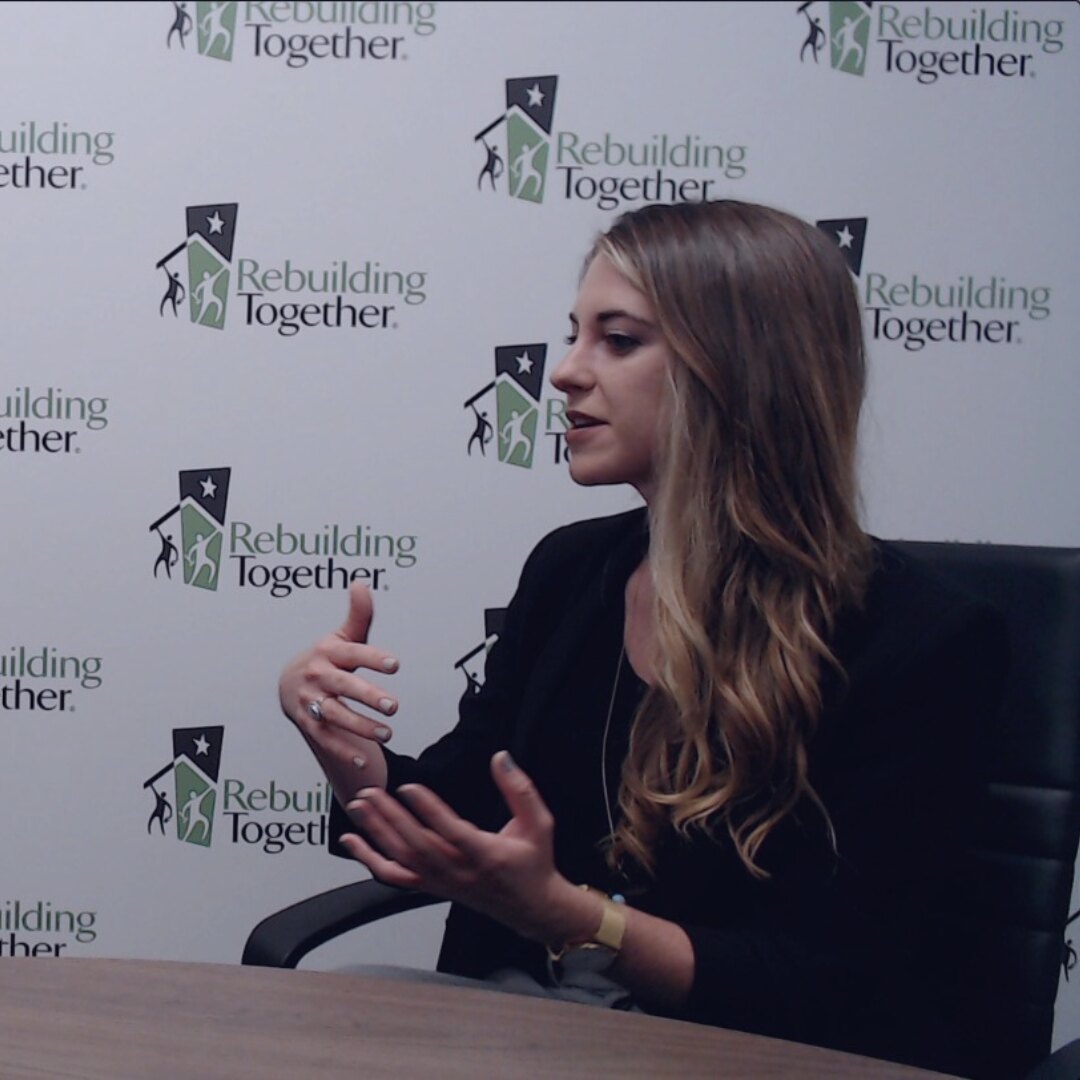 Kristin speaking on a Rebuilding Together panel.